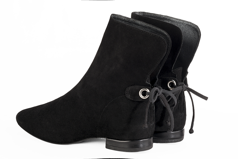 Matt black women's ankle boots with laces at the back. Round toe. Flat block heels. Rear view - Florence KOOIJMAN
